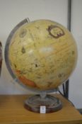 An illuminated table globe.
