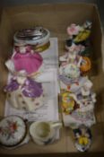 A small collection of decorative china figures etc.