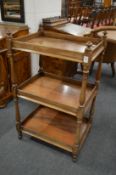 A Victorian mahogany three-tier whatnot.