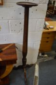 A mahogany tripod jardiniere stand.