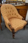 A good 19th century mahogany and button upholstered nursing chair.