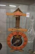 An unusual wooden skeleton clock.