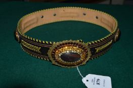A decorative leather belt by Cesar of Gstaad.
