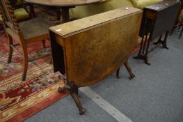 A Victorian burr walnut Sutherland table.