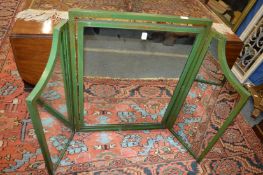 A large folding dressing table mirror with green and gilt painted frame.