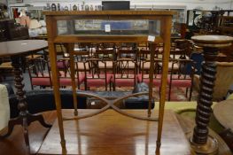 An Edwardian mahogany bijouterie table.