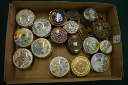 A collection of enamel and other pill boxes.