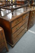 A 19th century oak straight front chest of two short and three graduated long drawers.