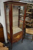 A French style mahogany vitrine.