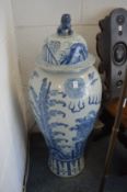 A good large pair of Chinese blue and white floor standing jars and covers.