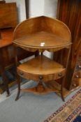 A 19th century mahogany corner washstand.