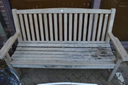A hardwood garden bench.