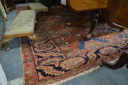 A good Persian design carpet, rust ground with stylised decoration, 340cm x 270cm.