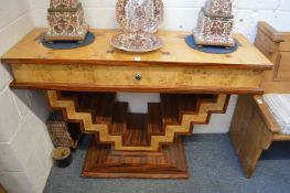 An Art Deco style console table.