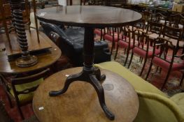 A 19th century mahogany tilt-top tripod table.