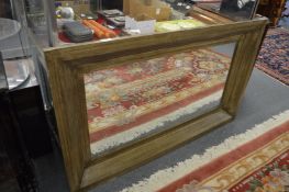 Decorative rectangular wall mirror.