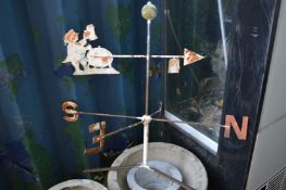 A wrought iron weather vane.