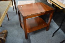 A mahogany two-tier occasional table.