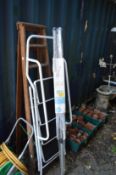 A washing line, unused together with two step ladders.