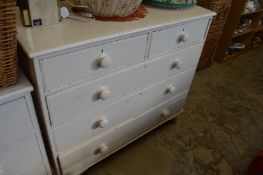 A painted pine chest of drawers.