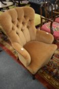 A button upholstered bedroom chair.
