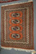 A small bokhara style rug, 97cm x 74cm.
