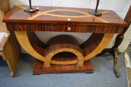 An Art Deco style console table.