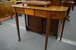 A mahogany D shaped side table.