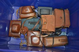 A collection of Kodak and other cameras.