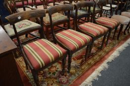 A pair of 19th century faux rosewood dining chairs with drop-in seats.
