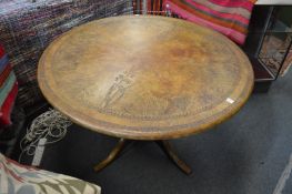 Workshop Wales, Fishguard, a circular dining table with embossed leather top depicting various birds