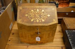 A gilt tooled leather stationery casket.