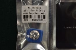 A Moissanite gem stone, 11mm in diameter with certificate.