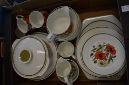 A quantity of poppy decorated china.
