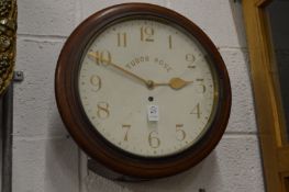 A mahogany cased circular wall clock.