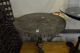 A decorative French bistro table.