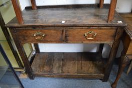 A small oak dresser with pot board base.