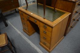 An oak twin pedestal desk.
