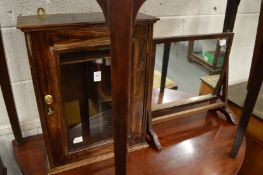 A hanging cabinet, toilet mirror, music seat and a stool.