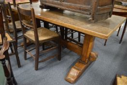An oak refectory dining table.
