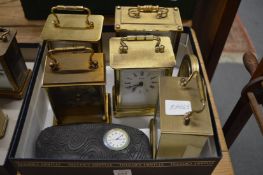 A collection of quartz operated carriage clocks and other clocks.