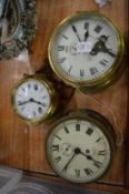 Three brass ship style clocks.