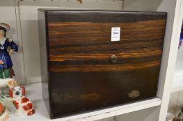 A good coromandel box with hinged cover.