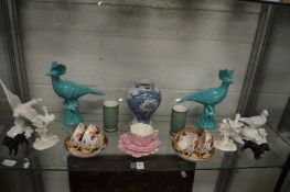 A shelf of decorative porcelain.