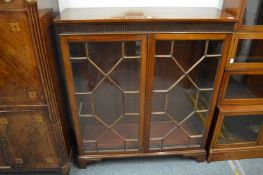 A mahogany astragal glazed two door bookcase.