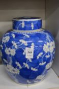 A large Chinese blue and white prunus jar and cover.