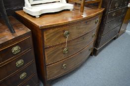 A mahogany bow fronted three drawer chest.