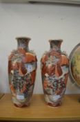 A pair of satsuma vases (restoration).