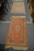 Two modern rugs, 134cm x 69cm and 141cm x 82cm.