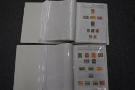 Two stamp albums and contents.